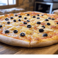 La Camembert chez Pizza Mania à Saint-Yrieix-la-Perche - une pizza savoureuse avec lardons, olives et fromage rustique.